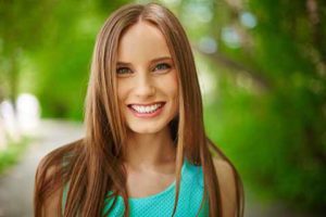 Porcelain-Veneers-in-Colorado-Springs-smiling-young-woman